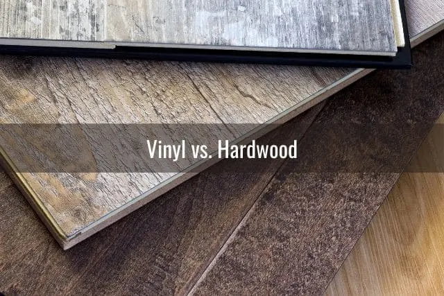 Layers of vinyl floor planks on top of each other