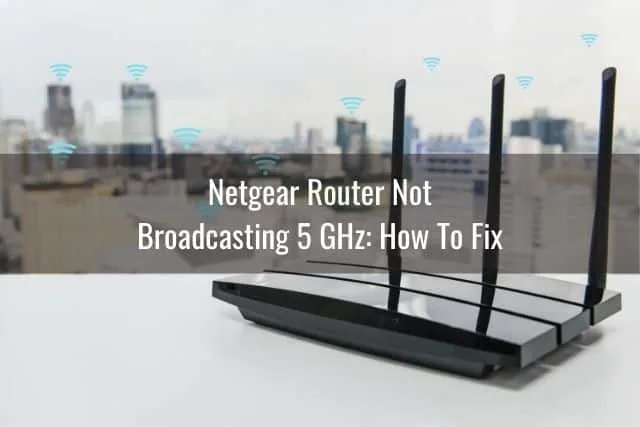 Router sitting on a counter with backdrop of city skyscrapers