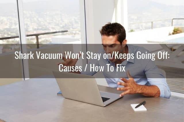 Frustrated man sitting in front of laptop