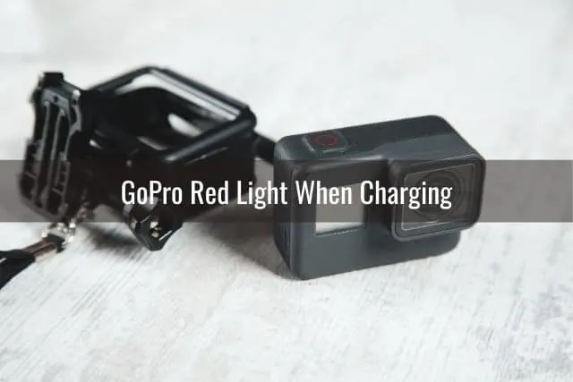 GoPro camera and case on white table