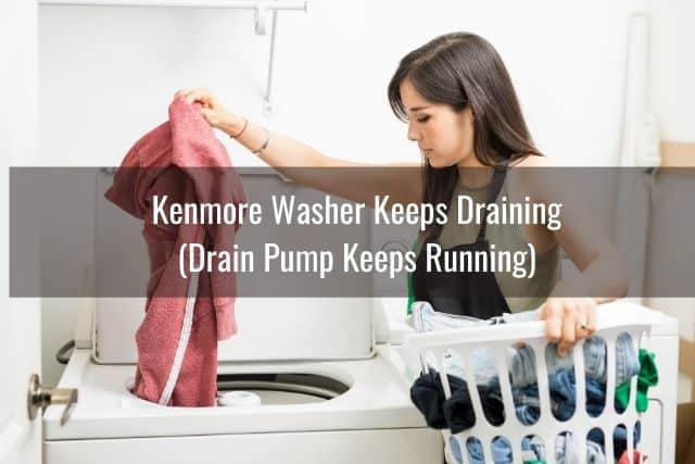 Woman putting clothes into washing machine