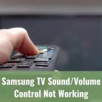 Hand holding TV remote