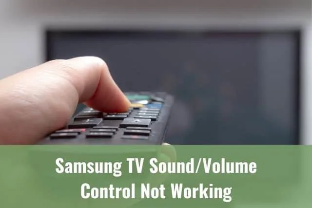 Hand holding TV remote