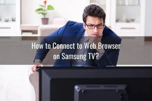 Businessman thinking and staring at TV screen