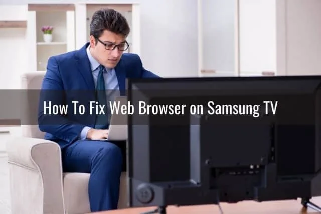 Businessman with laptop researching in front of TV