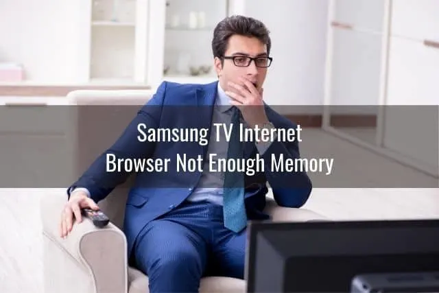 Perplexed businessman staring at TV