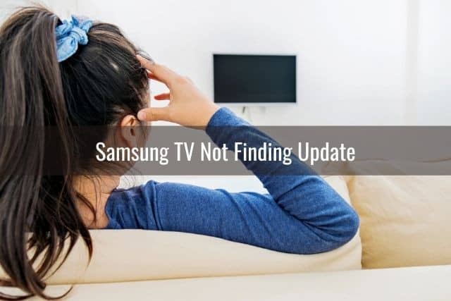 Woman on sofa with a TV that's off