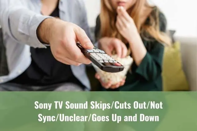Man holding a TV remote