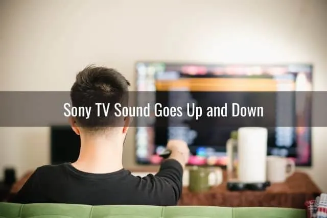 Male changing TV channel