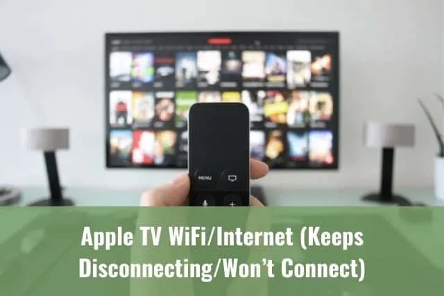 Streaming device remote held up in front of TV