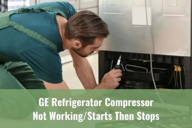 Repairman fixing fridge