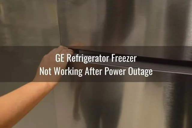 Hand opening fridge door