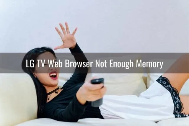 Angry woman lying on sofa with TV remote