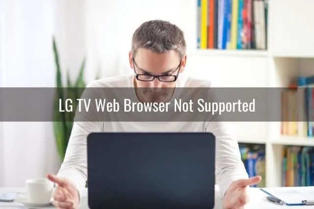 Man looking for answers to problem on laptop