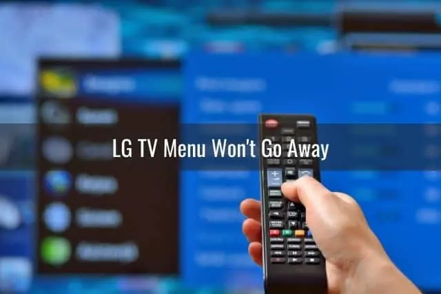 Hand pressing buttons on TV remote