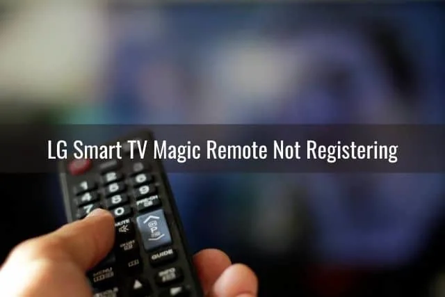 Hand holding TV remote