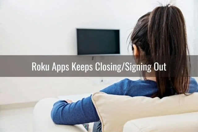 Female sitting in front of TV that is off