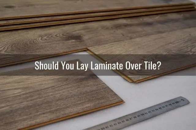 Laminate floor planks being fitted together