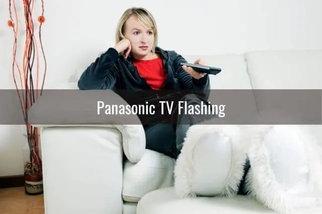 Female channel surfing TV programs