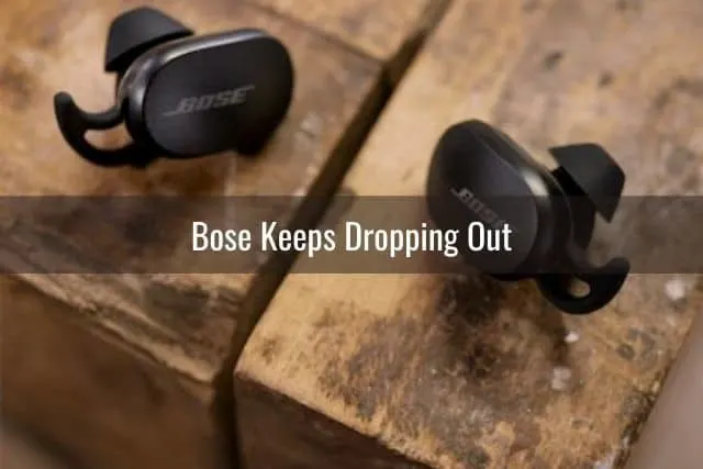 Earbuds on wood table
