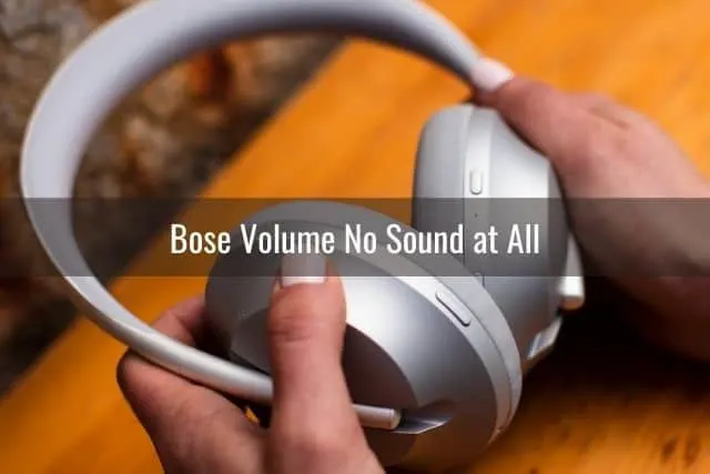 Audio headphones being placed on a table