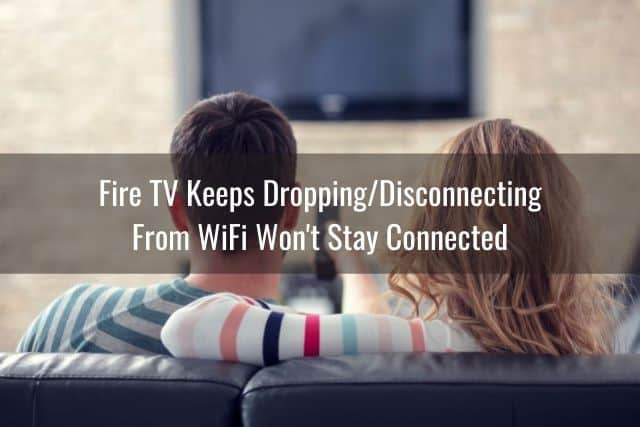 Couple watching blank TV screen