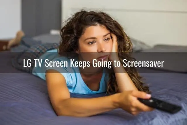 Bored female changing TV channels with remote