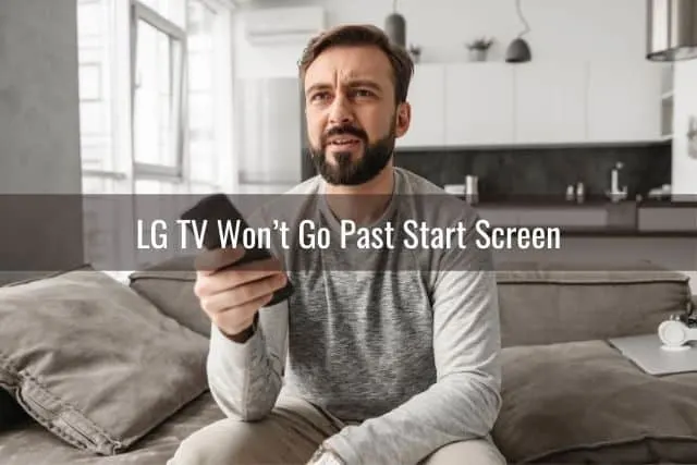 Confused male with TV remote
