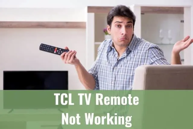 Confused male not knowing why TV is not working