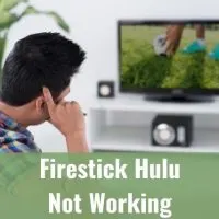 Male watching TV on sofa