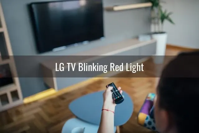 Female using remote to change TV channels