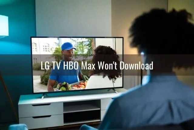 Male watching TV in living room