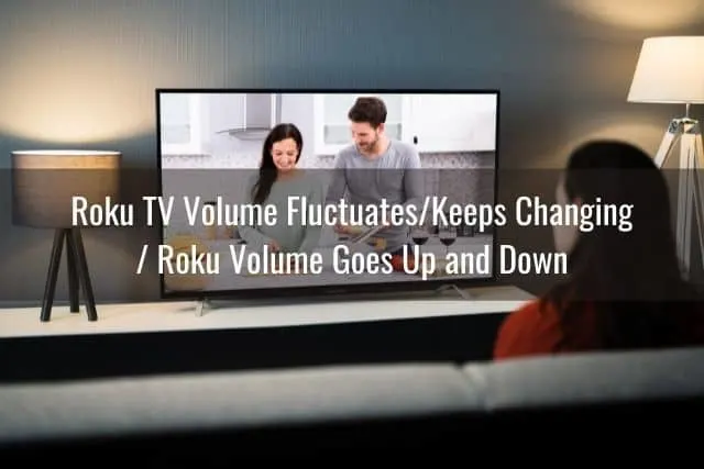 Female watching TV at night