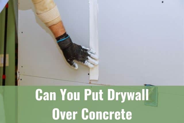 can drywall touch concrete