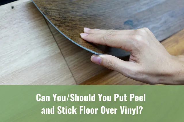Cropped Hand holding a vinyl flooring