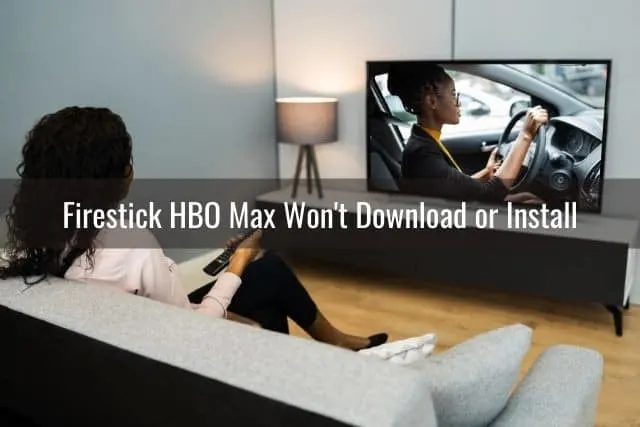 Female with remote watching TV