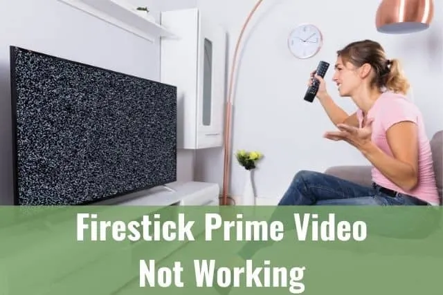 Female upset at TV that shows black static screen