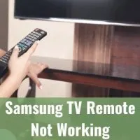 Hand holding a TV remote