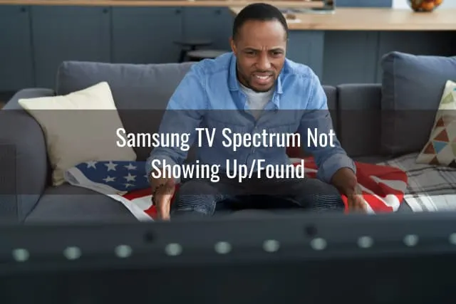 Man frustrated while watching TV