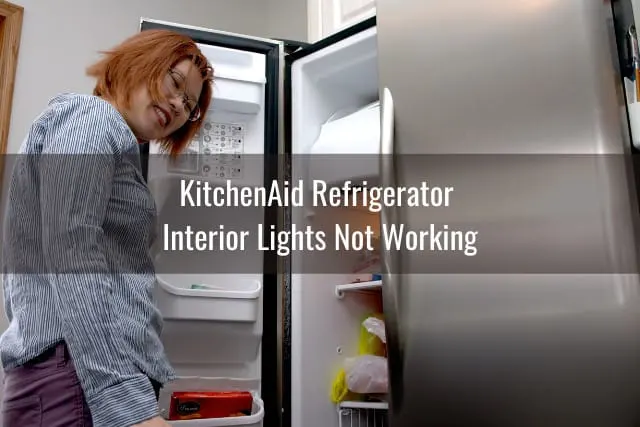Woman checking at the fridge