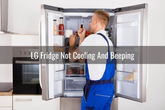 Repair man fixing refigerator