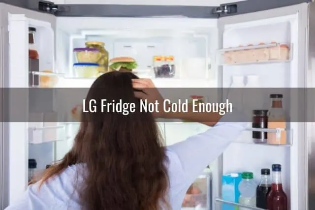 Girl looking for food in a fridge