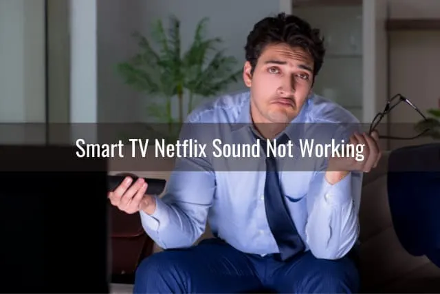 Disappointed man while watching TV