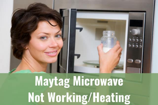 Woman putting cup inside the microwave