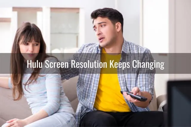 confused couple watching tv