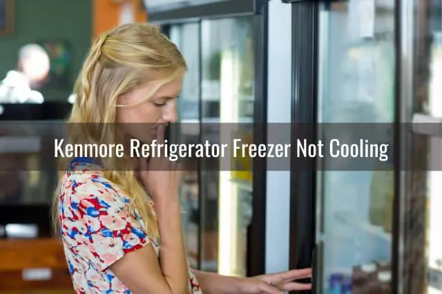 Confused woman looking at the refrigerator