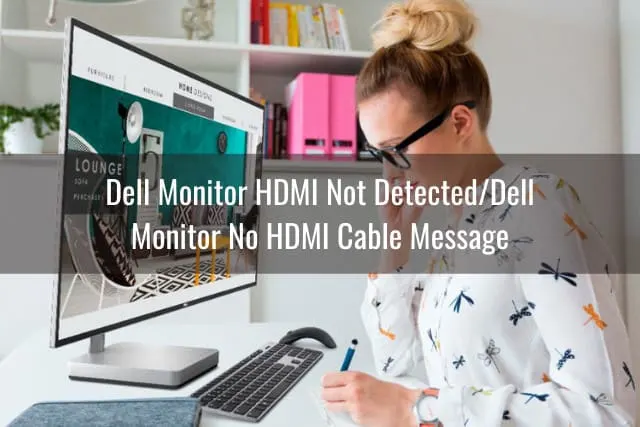 writing on the desk table with monitor on it