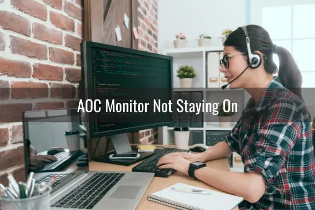 Confused woman while looking at the monitor