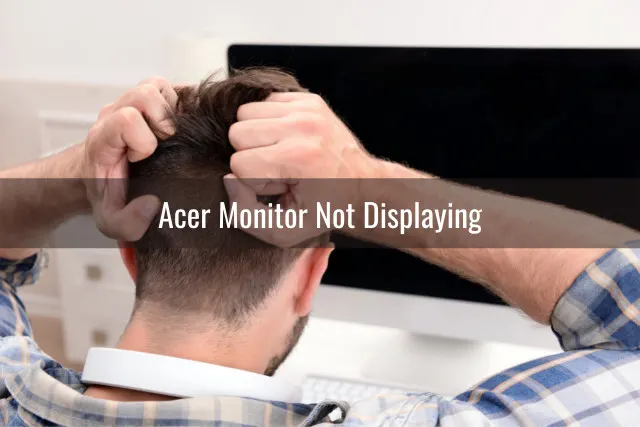 Frustrated man while looking at the monitor