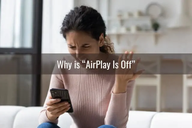 Frustrated woman while holding a phone